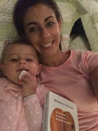 Mrs. Masters reading with child